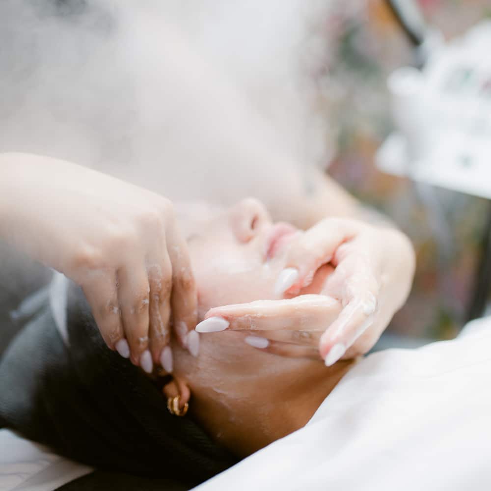 1757722834_woman-receiving-Sage-Vine-Indulgence-Facial Top Medical Grade Facials Richmond & Mechanicsville VA